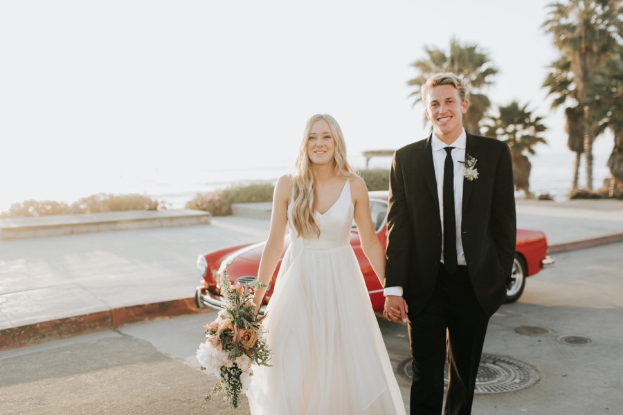 romantic darlington house wedding, la jolla california, vintage red car, just married, San Diego cliffs