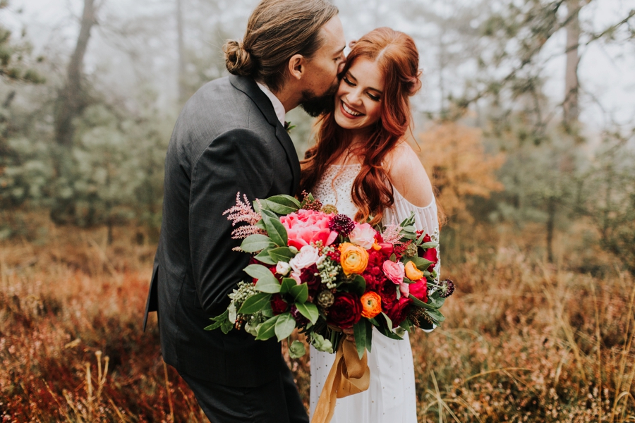 bride and groom natural poses, foggy fall elopement inspiration